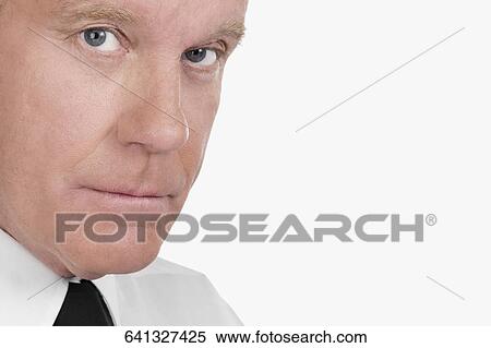 Portrait of a waiter looking serious View Large Photo Image Stock Photography - Portrait of a waiter looking serious. Fotosearch