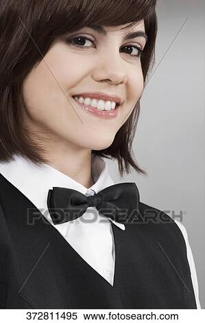 Portrait of a waitress smiling View Large Photo Image Stock Photography - Portrait of a waitress smiling. Fotosearch