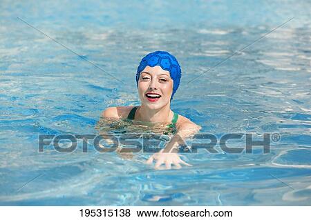 Portrait of a woman in a swimming pool, Biltmore Hotel, Coral Gables, Florida, USA View Large Photo Image Stock Photo - Portrait of a woman in a swimming pool, Biltmore Hotel, Coral Gables, Florida, USA. Fotosearch
