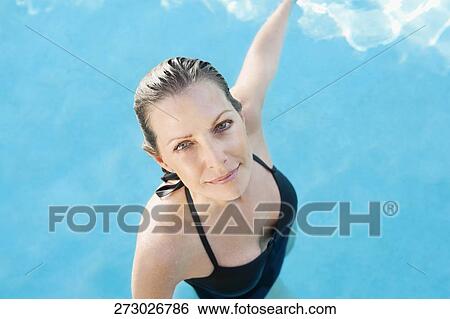 Portrait of a woman in a swimming pool, Biltmore Hotel, Coral Gables, Florida, USA View Large Photo Image Stock Photograph - Portrait of a woman in a swimming pool, Biltmore Hotel, Coral Gables, Florida, USA. Fotosearch