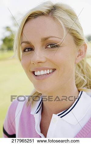 Portrait of a woman smiling, Biltmore Golf Course, Coral Gables, Florida, USA View Large Photo Image Stock Image - Portrait of a woman smiling, Biltmore Golf Course, Coral Gables, Florida, USA. Fotosearch