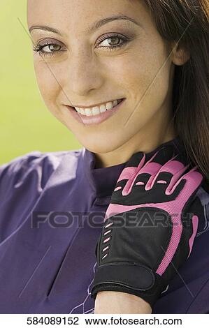 Portrait of a woman smiling, Biltmore Golf Course, Coral Gables, Florida, USA View Large Photo Image Stock Image - Portrait of a woman smiling, Biltmore Golf Course, Coral Gables, Florida, USA. Fotosearch