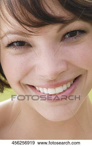 Portrait of a woman smiling, Biltmore Golf Course, Coral Gables, Florida, USA View Large Photo Image Stock Photo - Portrait of a woman smiling, Biltmore Golf Course, Coral Gables, Florida, USA. Fotosearch