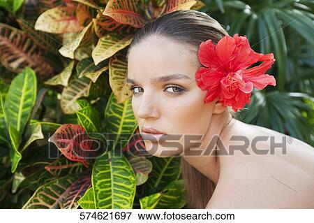 Portrait of a woman wearing flowers, Biltmore Hotel, Coral Gables, Florida, USA View Large Photo Image Stock Photo - Portrait of a woman wearing flowers, Biltmore Hotel, Coral Gables, Florida, USA. Fotosearch