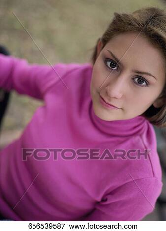 Stock Photo - Portrait of a young woman. Fotosearch