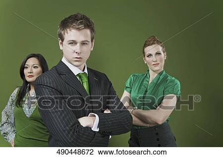 Stock Image - Portrait of three business executives. Fotosearch