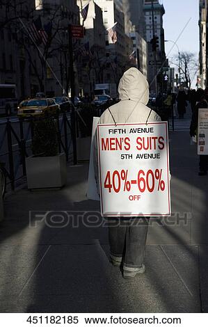 Rear view of a sandwich board man on a street, Fifth Avenue, Manhattan, New York City, New York State, USA View Large Photo Image Stock Photography - Rear view of a sandwich board man on a street, Fifth Avenue, Manhattan, New York City, New York State, USA. Fotosearch