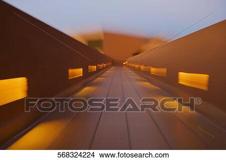 Picture - Reflection on traversing walkway, Santa Fe, New Mexico, USA. Fotosearch