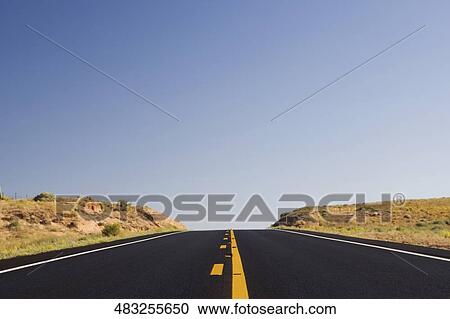 Road passing through a landscape, Page, Arizona, USA View Large Photo Image Stock Image - Road passing through a landscape, Page, Arizona, USA. Fotosearch