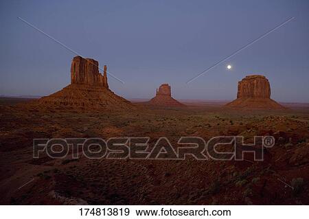 Stock Photo - Rock formations on a landscape, Monument Valley Tribal Park, Arizona-Utah, USA. Fotosearch