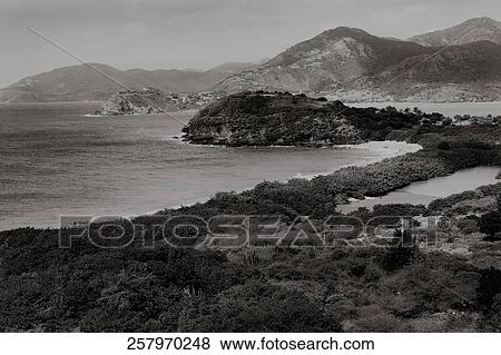 Rock formations on the coast View Large Photo Image Stock Photo - Rock formations on the coast. Fotosearch