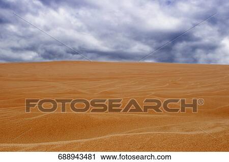 Stock Image - Sand dunes in a desert, Coral Pink Sand Dunes State Park, Utah, USA. Fotosearch
