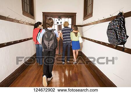 School children walking in the school corridor View Large Photo Image Stock Image - School children walking in the school corridor. Fotosearch