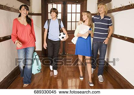 School children walking in the school corridor View Large Photo Image Stock Photography - School children walking in the school corridor. Fotosearch
