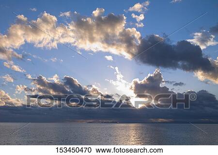 Sea at sunset View Large Photo Image Stock Image - Sea at sunset. Fotosearch