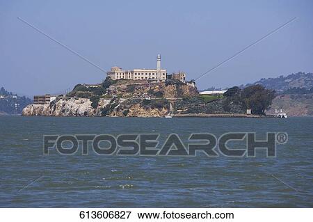 Stock Photo - Sea with a prison in the background, Alcatraz Prison, Alcatraz Island, San Francisco Bay, San Francisco, California, USA. Fotosearch