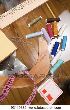 Sewing items in a clothing design studio View Large Photo Image Stock Image - Sewing items in a clothing design studio. Fotosearch