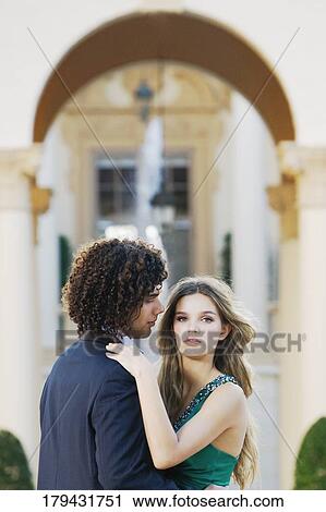 Stock Image - Side profile of a couple romancing, Coral Gables, Florida, USA. Fotosearch