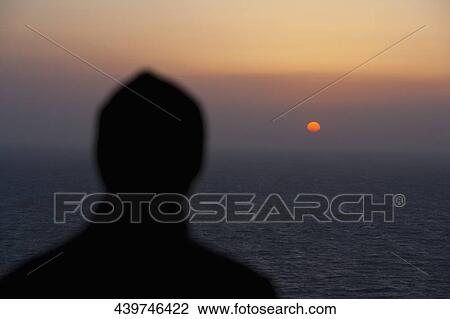 Silhouette of a man looking at sunset view, San Francisco Bay, San Francisco, California, USA View Large Photo Image Stock Image - Silhouette of a man looking at sunset view, San Francisco Bay, San Francisco, California, USA. Fotosearch