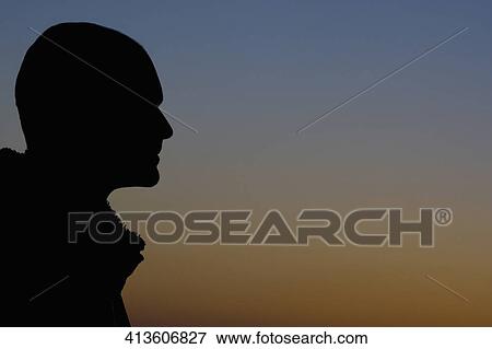 Stock Photo - Silhouette of a man thinking, Santa Monica, Los Angeles County, California, USA. Fotosearch