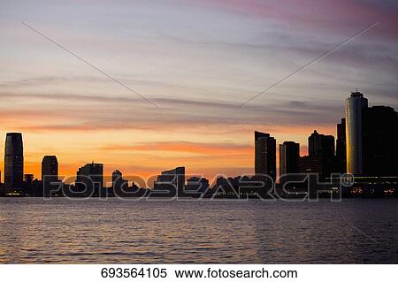 Silhouette of buildings at the waterfront, New York City, New York State, USA View Large Photo Image Stock Photography - Silhouette of buildings at the waterfront, New York City, New York State, USA. Fotosearch