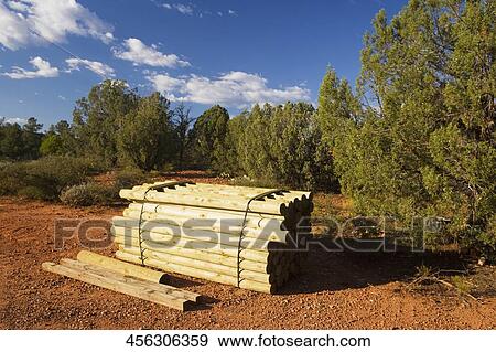 Stack of logs in a field, Sedona, Arizona, USA View Large Photo Image Stock Photo - Stack of logs in a field, Sedona, Arizona, USA. Fotosearch