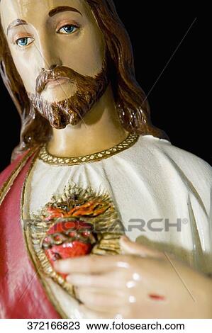 Statue of Jesus Christ in a church, Star of the Sea Painted Church, Hawaii, USA View Large Photo Image Stock Image - Statue of Jesus Christ in a church, Star of the Sea Painted Church, Hawaii, USA. Fotosearch