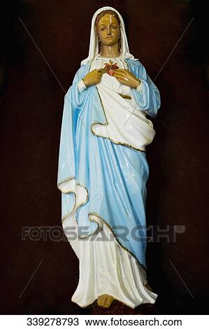 Stock Image - Statue of Virgin Mary in a church, Star of the Sea Painted Church, Hawaii, USA. Fotosearch