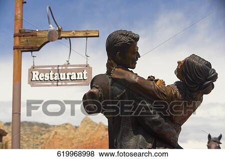 Stock Photo - Statues of a romantic couple, Sedona, Arizona, USA. Fotosearch