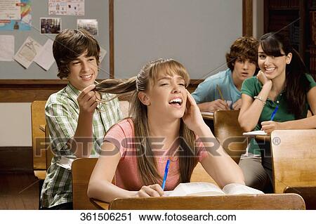 Students sitting in a classroom View Large Photo Image Stock Image - Students sitting in a classroom. Fotosearch