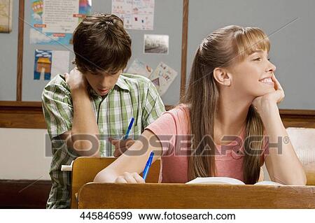 Stock Photo - Students sitting in a classroom. Fotosearch