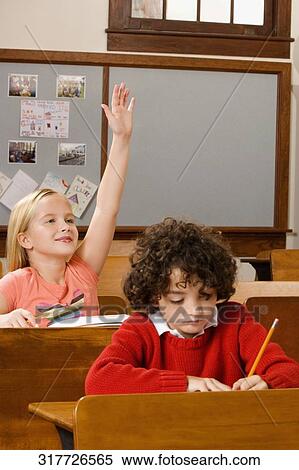 Students studying in a classroom View Large Photo Image Stock Photography - Students studying in a classroom. Fotosearch