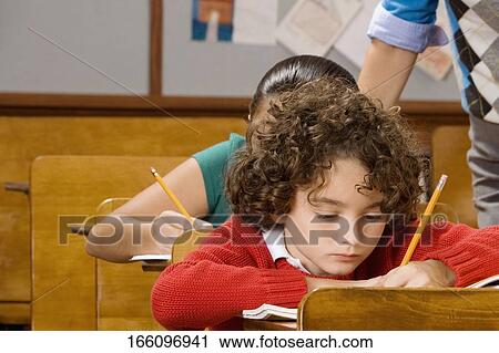 Students with their teacher in a classroom View Large Photo Image Stock Image - Students with their teacher in a classroom . Fotosearch