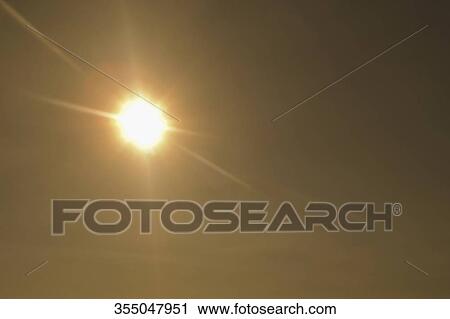 Stock Image - Sun shining in the sky, Arizona, USA. Fotosearch