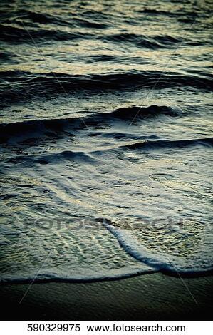 Surf on the beach View Large Photo Image Stock Photography - Surf on the beach. Fotosearch