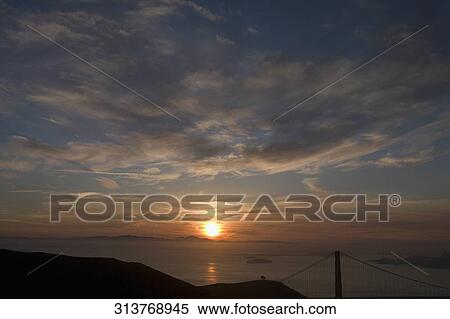 Suspension bridge at sunset, Golden Gate Bridge, San Francisco Bay, San Francisco, California, USA View Large Photo Image Stock Photography - Suspension bridge at sunset, Golden Gate Bridge, San Francisco Bay, San Francisco, California, USA. Fotosearch