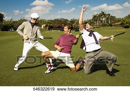 Three friends having fun in a golf course, Biltmore Golf Course, Coral Gables, Florida, USA View Large Photo Image Stock Photo - Three friends having fun in a golf course, Biltmore Golf Course, Coral Gables, Florida, USA. Fotosearch
