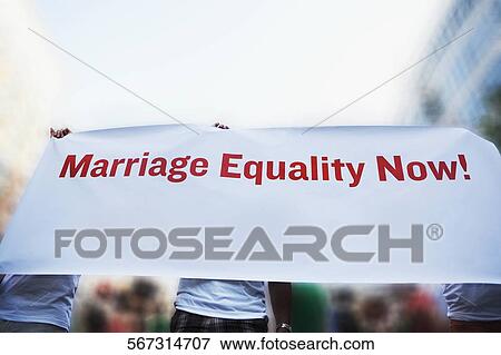 Three gay men holding a Marriage Equality banner, Washington DC, USA View Large Photo Image Stock Photo - Three gay men holding a Marriage Equality banner, Washington DC, USA. Fotosearch