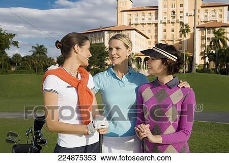 Three golfers standing in a golf course and smiling, Biltmore Golf Course, Biltmore Hotel, Coral Gables, Florida, USA View Large Photo Image Stock Image - Three golfers standing in a golf course and smiling, Biltmore Golf Course, Biltmore Hotel, Coral Gables, Florida, USA. Fotosearch