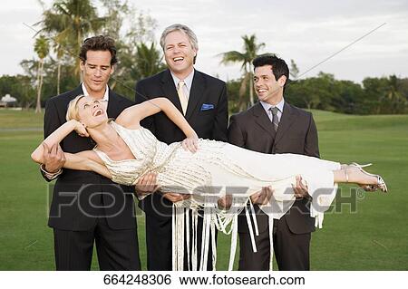 Three men lifting a bride in a golf course, Biltmore Golf Course, Coral Gables, Florida, USA View Large Photo Image Stock Photograph - Three men lifting a bride in a golf course, Biltmore Golf Course, Coral Gables, Florida, USA. Fotosearch