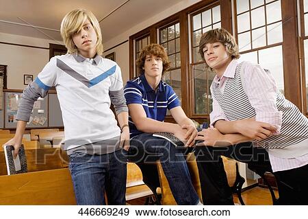 Three teenage boys in a classroom View Large Photo Image Stock Photo - Three teenage boys in a classroom. Fotosearch