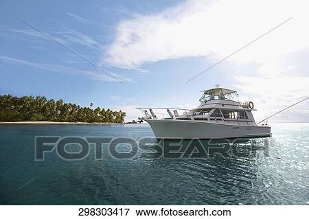 Tourboat in the sea View Large Photo Image Stock Photo - Tourboat in the sea. Fotosearch