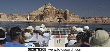 Tourist on a boat, Glen Canyon Dam, Lake Powell, Colorado River, Page, Arizona, USA View Large Photo Image Stock Photo - Tourist on a boat, Glen Canyon Dam, Lake Powell, Colorado River, Page, Arizona, USA. Fotosearch