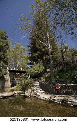 Tourist sitting at the riverbank, San Luis Obispo, California, USA View Large Photo Image Stock Image - Tourist sitting at the riverbank, San Luis Obispo, California, USA. Fotosearch
