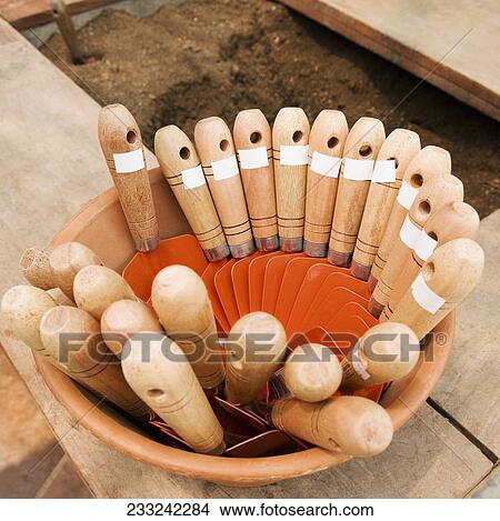Trowels in a pot View Large Photo Image Picture - Trowels in a pot. Fotosearch