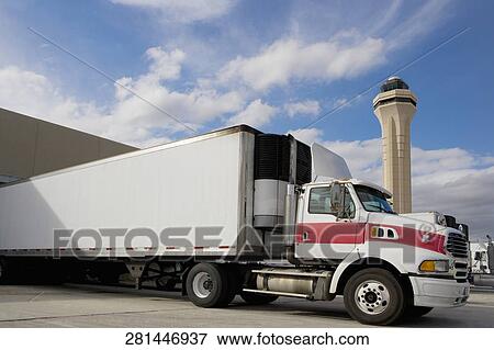 Truck at an airport, Miami International Airport, Miami, Florida, USA View Large Photo Image Stock Photo - Truck at an airport, Miami International Airport, Miami, Florida, USA. Fotosearch
