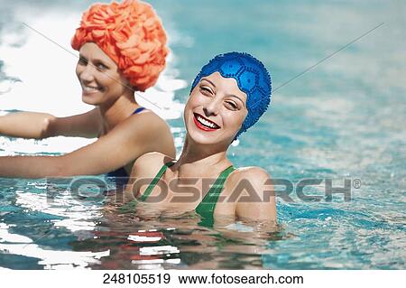 Two women in a swimming pool, Biltmore Hotel, Coral Gables, Florida, USA View Large Photo Image Stock Photo - Two women in a swimming pool, Biltmore Hotel, Coral Gables, Florida, USA. Fotosearch