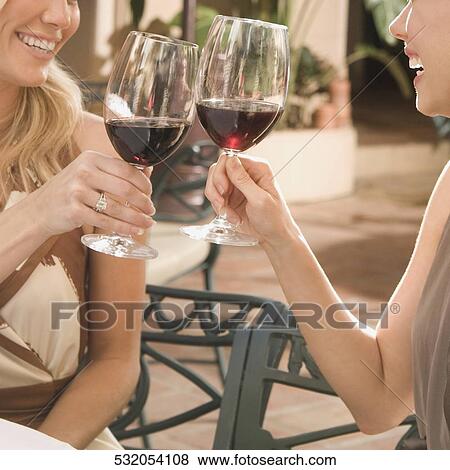 Two women toasting with drinks in a hotel, Biltmore Hotel, Coral Gables, Florida, USA View Large Photo Image Stock Photo - Two women toasting with drinks in a hotel, Biltmore Hotel, Coral Gables, Florida, USA. Fotosearch