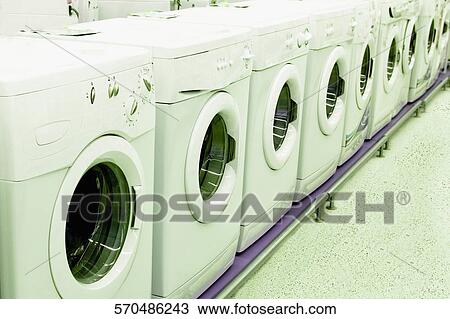 Stock Image - Washing machines in a supermarket. Fotosearch