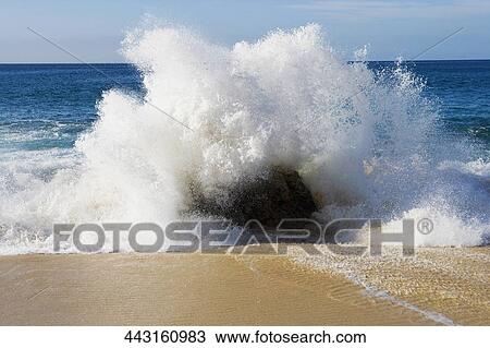 Stock Image - Waves crashing on the beach, Santa Fe, New Mexico, USA. Fotosearch